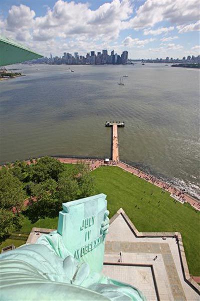 Not only can you see more of Lady Liberty, you're getting a stellar view of Lower Manhattan